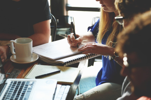 casual collaboration in modern workspace, focused conversation